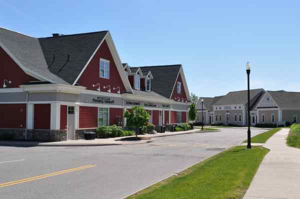 Rear of Building C, via Thruway Park Drive.  Buildings D and F will eventually be in the lot on the right side of the street.